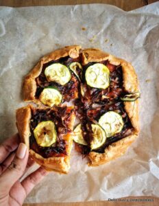 Caramelised onion & zucchini galette, sliced