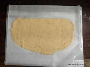 Flatbread on parchment sheet